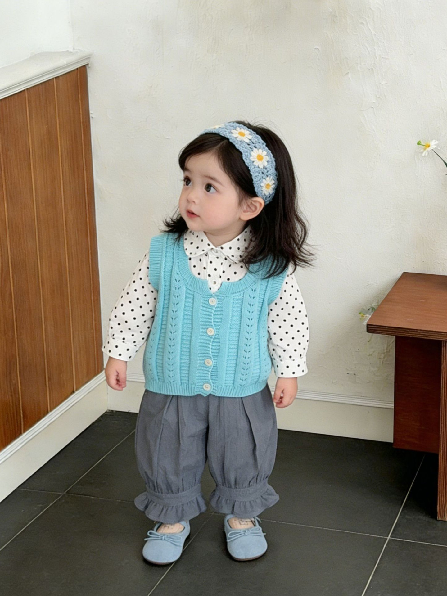 Niñas de primavera 2026 nuevo chaleco de moda de otoño estilo coreano chaleco de punto extranjero vestido de bebé sin mangas