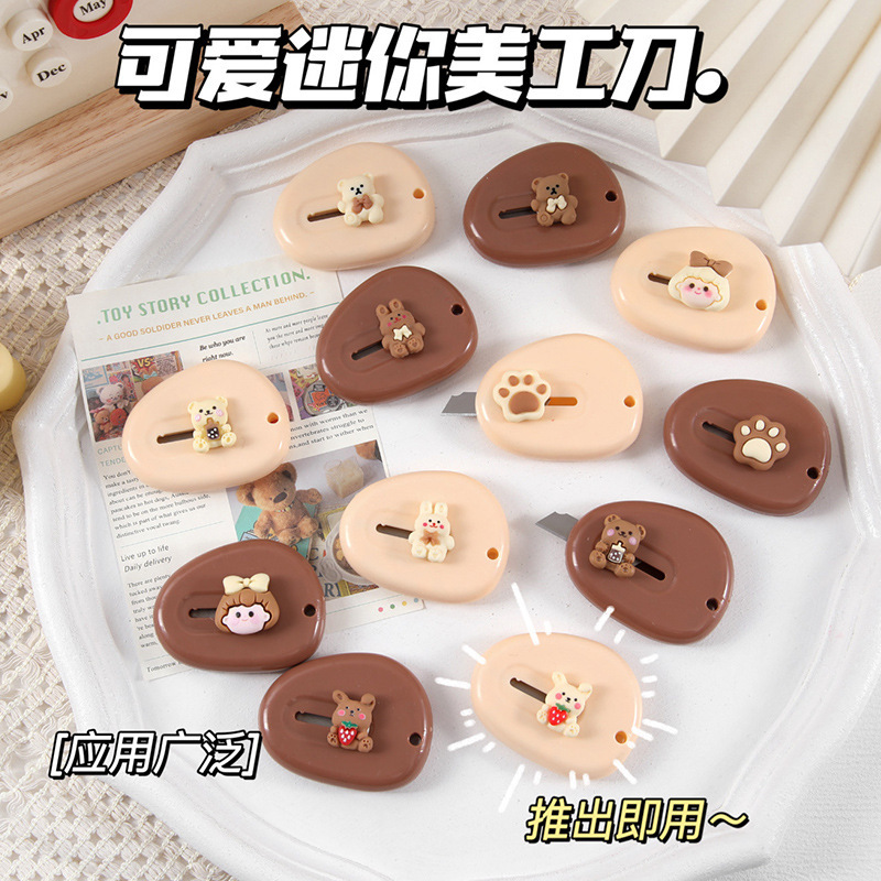 Cute dibujos animados color crema arte cuchillo mini split expreso desembalaje cuchillo portátil corte mano cuenta papel corte cuchillo al por mayor