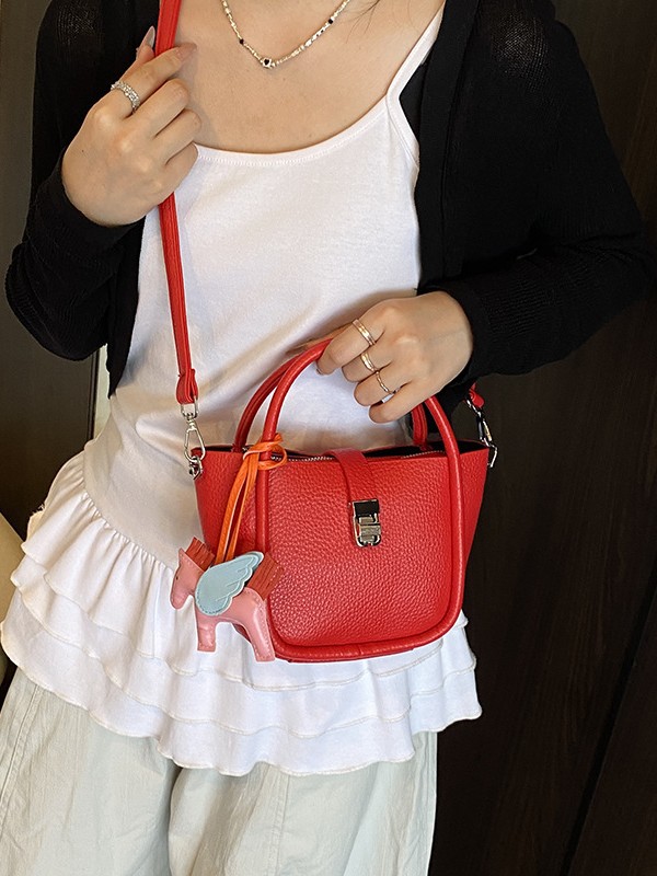 Bolso de cubo para mujer, tendencia transfronteriza de alta gama, bolso de mano con patrón de lichi, viaje diario, bolsa de mensajero de canasta de verduras de estilo occidental