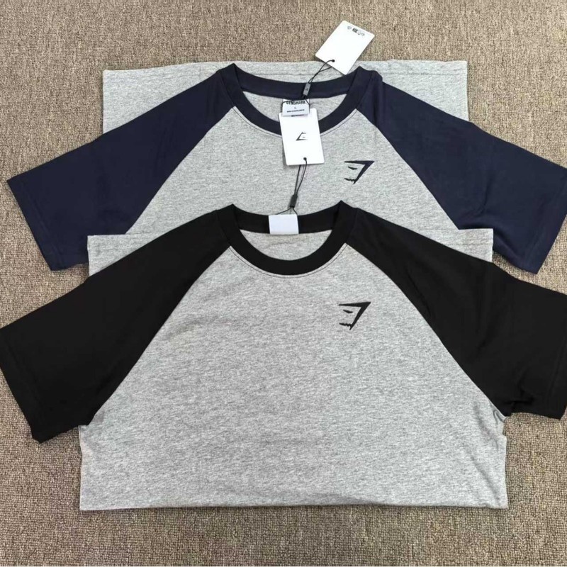 Gymshark raglon修身半袖tシャツ男性は体の弾力性を示しています。|undefined