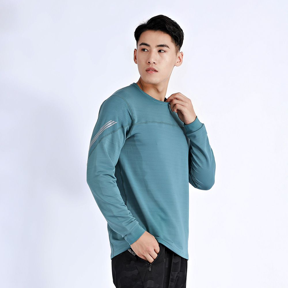 El otoño y el invierno de los hombres de deportes camiseta superior al aire libre de la aptitud de secado rápido de manga larga estiramiento suelto más tamaño en la acción al por mayor A