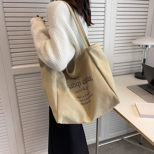 Canvas bag women's large capacity 2024 new versatile shoulder bag cloth bag college student class bag commuter tote bag