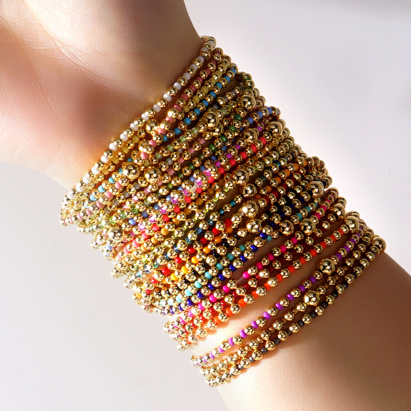 Korean style small fragrant elastic bracelet color rice beads gold beads mix and match woven light luxury high sense explosive bracelet wholesale