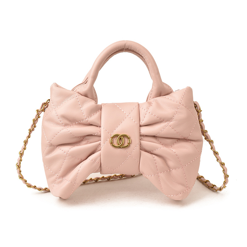 Bolsa de mano de chicas arco dulce cadena de diamante pliegue bolso de hombro 2026 nuevo bolso infantil transfronterizo