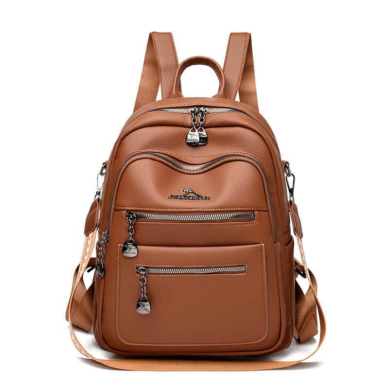 Textura transfronteriza mochila de cuero suave, mochila de damas, 2025 nueva moda, ocio, moda, mochila multipropósito de viaje
