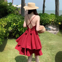 西双版納のハスの葉の辺は腰を収めて海辺の休暇のビーチのスカートのvネックを現してやせている赤いガーターのワンピースの夏を現します。