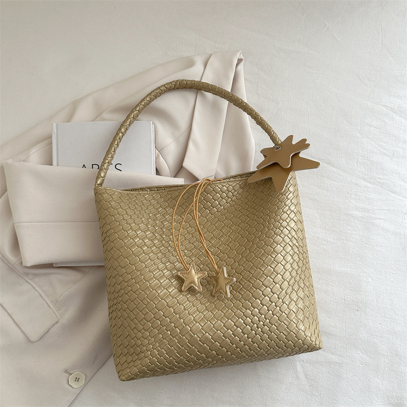 2025 bolso tejido súper caliente para mujer nuevo bolso de axila de un solo hombro de alta gama para mujer bolso de viaje de gran capacidad