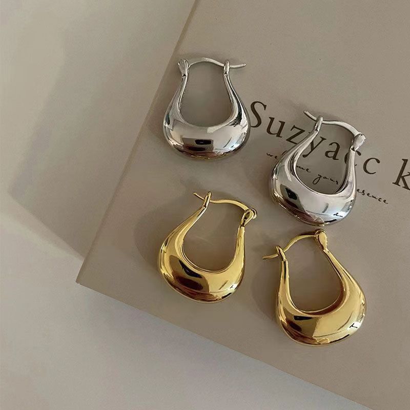 Ventas transfronterizas de moda nueva moda simple pendientes de moda femenina temperamento creativo pendientes de nicho de diseño sensación de pendientes al por mayor