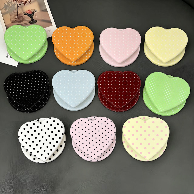 TikTok trending Korean-style minimalist polka dot magnetic suction airbag phone case with a retractable and foldable stand TikTok trending Korean-style minimalist polka dot magnetic suction airbag phone case with a retractable and foldable stand