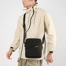 跨境男士女士电脑背包斜挎休闲商务旅行高级感通勤防水大容量单肩