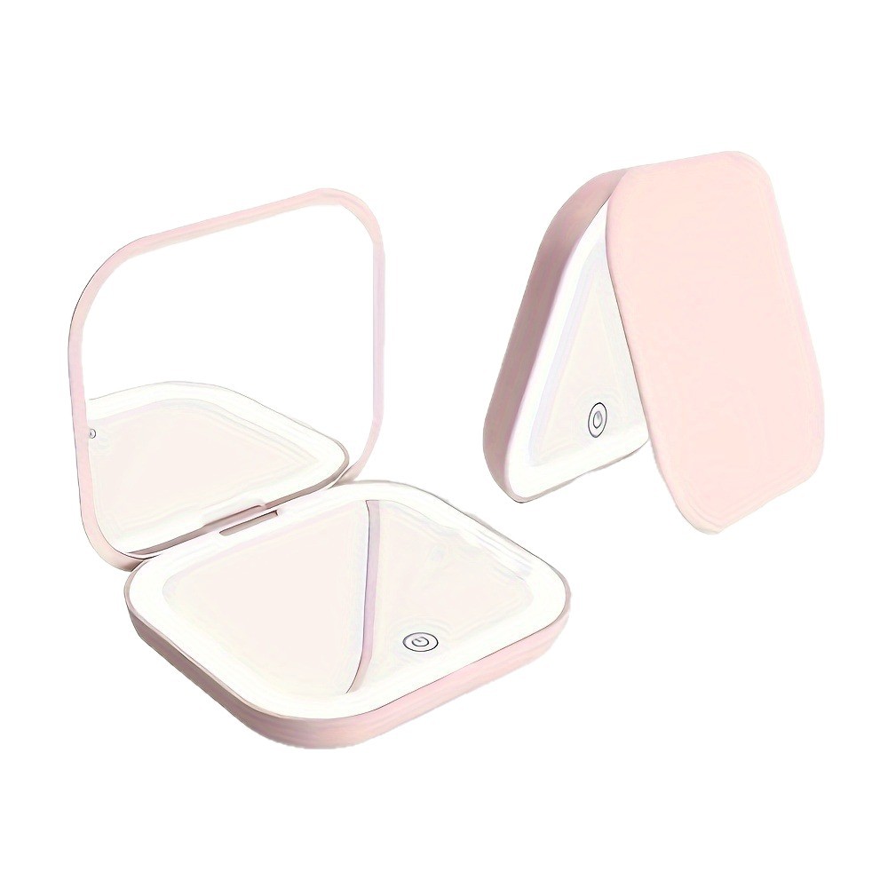 Venta directa de fábrica Espejo de maquillaje Regalo portátil Espejo de maquillaje de mano plegable con luz de carga Modelo avanzado transfronterizo