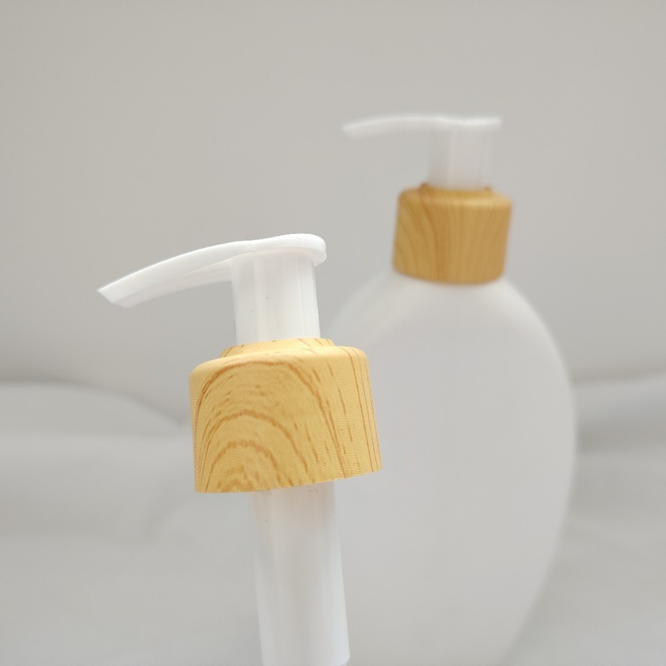 24.28左右开关泵头 木纹乳液压泵头 沐浴露洗发露乳液泵
