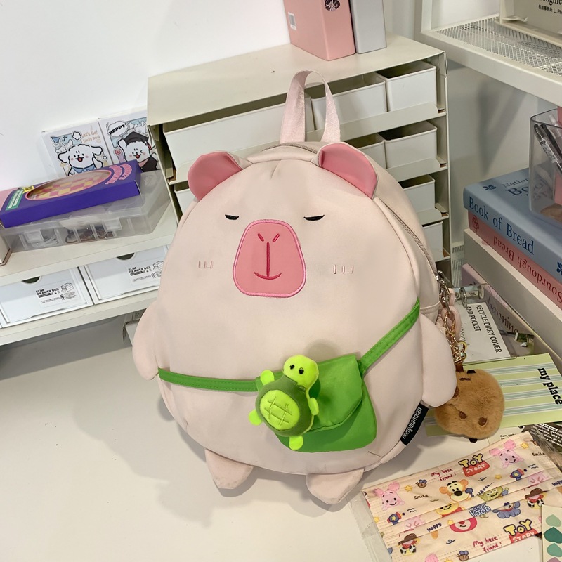 Mochila japonesa encantadora de dibujos animados 2024 nueva extraña mochila de muñeca de gran capacidad de muñeca de estudiantes