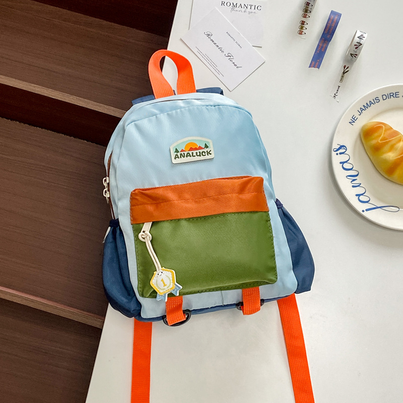 2025 mochila de moda coreana para niños y niñas, mochila para niños de jardín de infantes, nueva mochila para niños de color exterior