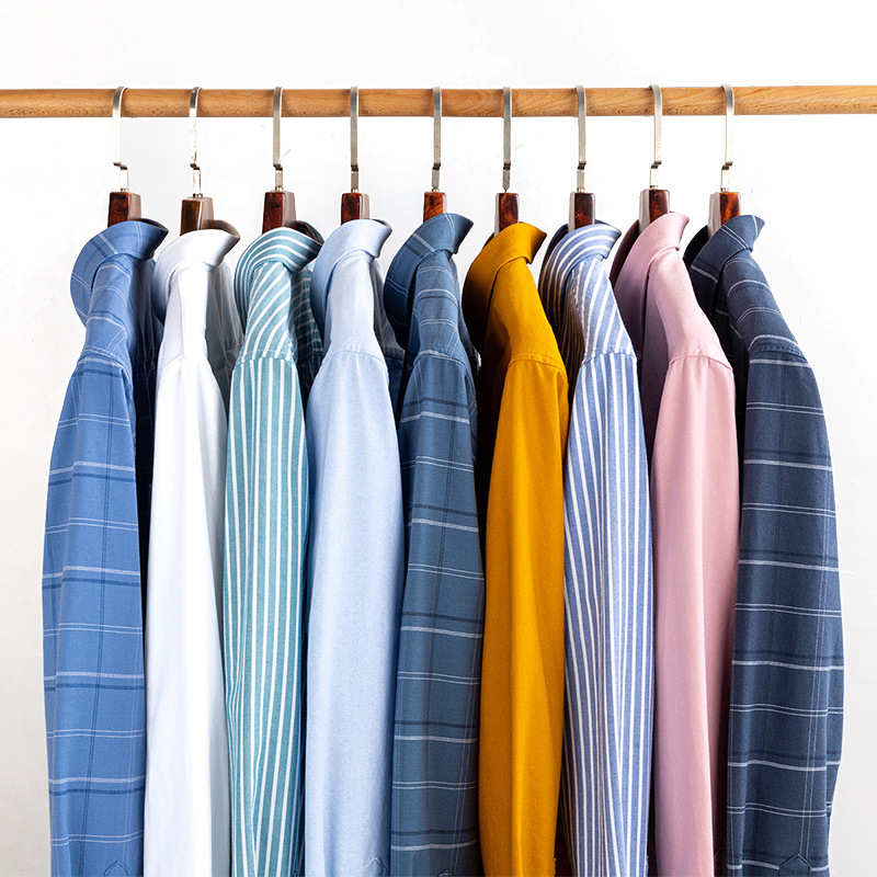 Nueva camisa Oxford de algodón para hombre, estilo casual, manga larga, color sólido, entallada, para uso exterior e interior.