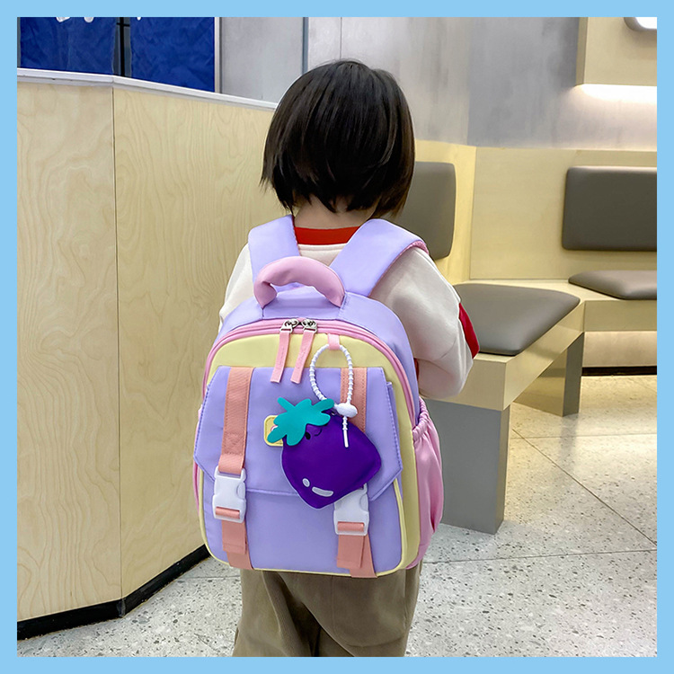 Nueva mochila escolar de jardín de infantes, reducción de la carga ligera, color de contraste, mochila de tendencia, mochila escolar pequeña para niños, mochila de viaje