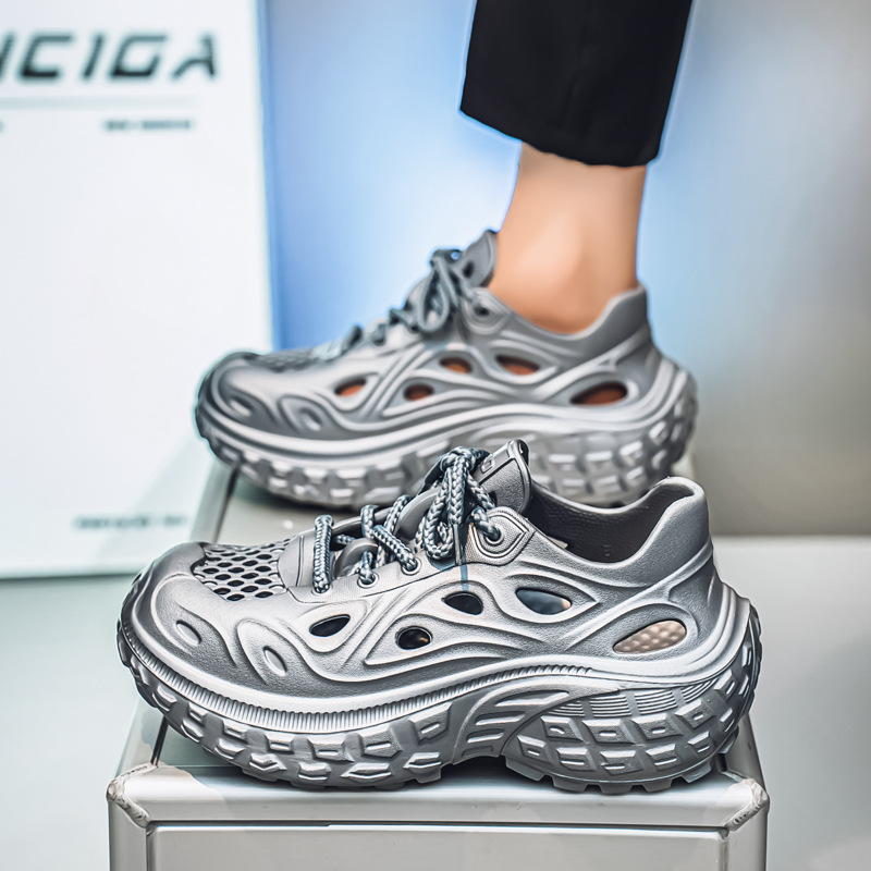 Diseñador de zapatos de coco de lujo ligero 2025 Xia Kanye Pareja al aire libre playa zapatos con agujeros Douyin video sandalias hombre