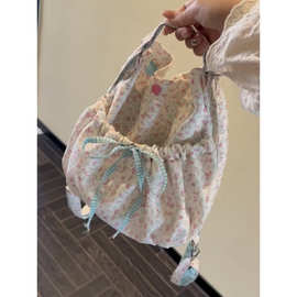 粉色碎花蝴蝶结双肩包女2025新款韩系大容量褶皱单肩包通勤水桶包