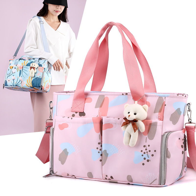 Latest Fashion Mommy Bag Wholesale Large Capacity Handheld Baby Maternity Bag Multifunctional with Hanging Baby Cart Storage Milk Storage Bag