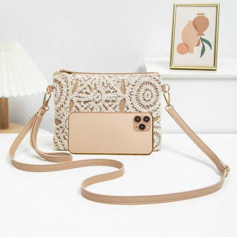 Bolsas de paja casuales coreanas, bolsas de mujer retro de playa, bolsas huecas, nuevas flores de moda de un solo hombro, bolsas de ganchillo.