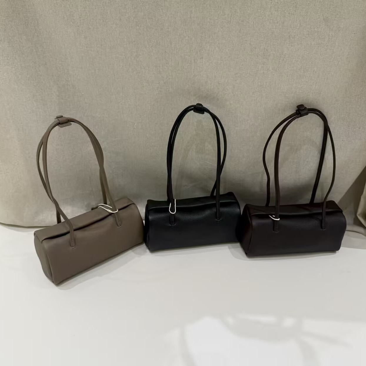 High-end, minimalist design, first-layer cowhide bowling bag, pillow bag, commuter tote, shoulder bag, and underarm bag – a trendy choice