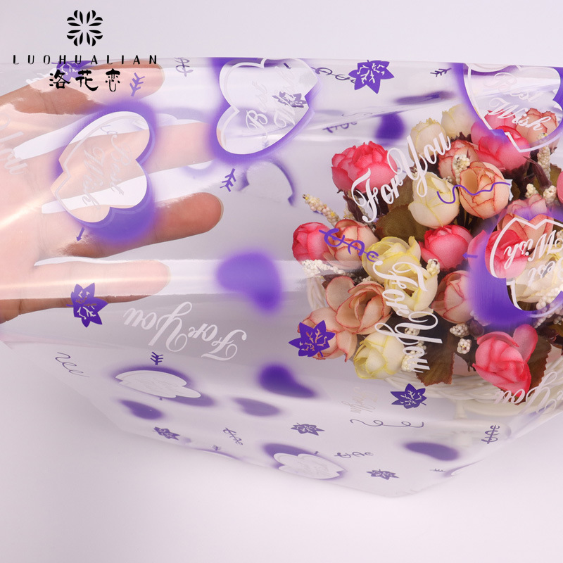 Papel de embalaje de flores, papel de vidrio transparente, papel de embalaje de manzanas de navidad, ramo de flores de corazón, fábrica de papel de embalaje de regalos al por mayor