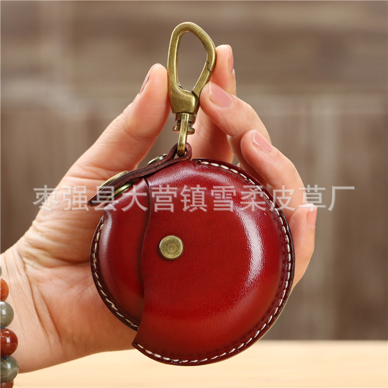 クリエイティブな一層牛革製ハンドメイド小銭入れ、イヤホンケーブル収納バッグ、丸型バッグ、ペンダント、小物入れ、レトロ収納バッグ