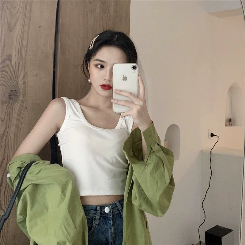 Tank top, elastic fitted white underwear as outerwear, lifting effect