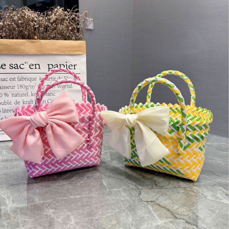 Bow manufacturers plastic woven handbag children's day woven basket hand gift basket beach bag handbag