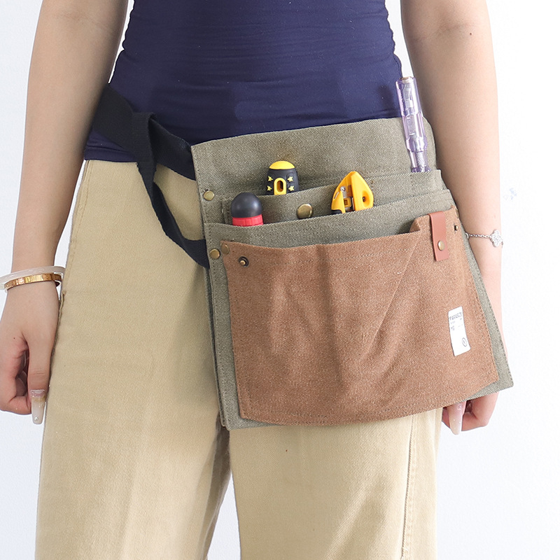 Nuevo delantal de lona gruesa transfronteriza logotipo personalizado de moda coreana empalmado de gran capacidad de lona herramientas de cintura delantal