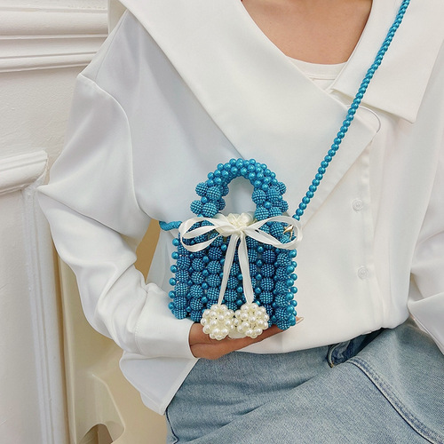 Fairy bag summer new 2024 forest bow style handbag ins crossbody pearl woven bag trendy