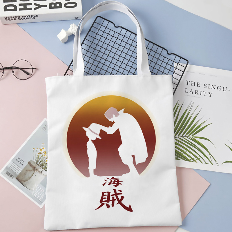 Una pieza de dibujos animados bolsa de lona impresa bolsa de hombro bolsa plegable bolsa de compras portátil Comercio exterior transfronterizo
