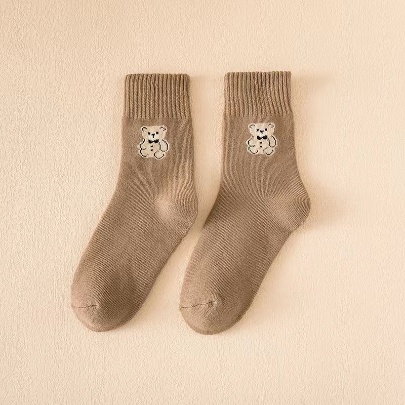 Oso Otoño e Invierno calcetines cálidos al por mayor de las mujeres a media pantorrilla forrada de lana engrosada resistente al frío Terry calcetines toalla Calcetines de piso