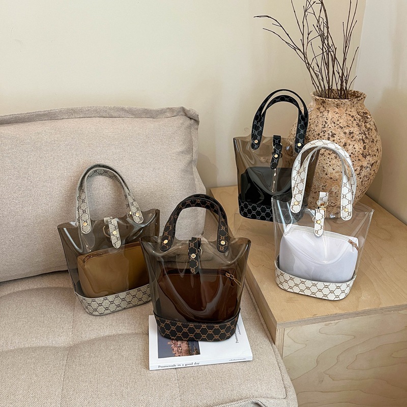 Bolsa de cubo transparente de moda de empalme de primavera y verano de 2026 nueva impresión de contraste de color personalidad bolso de hombro de textura mochila de moda