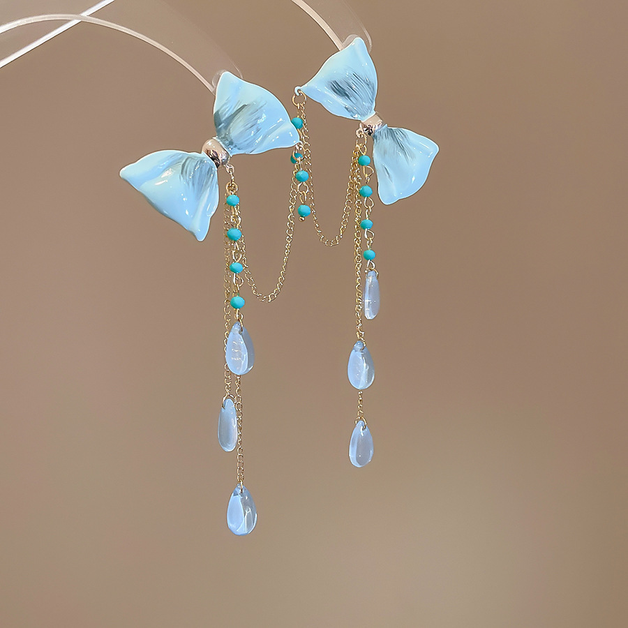 Pendientes de borla de cuentas de arroz de flor de gasa de aguja de plata Pendientes de todo fósforo de estilo de vacaciones Pendientes frescos y dulces para mujer