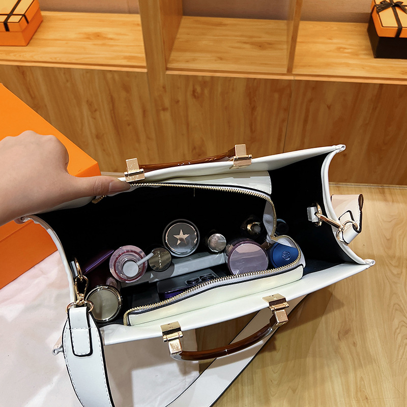 Bolso de hombro transfronterizo para mujer Bolso de mano de diseño de nicho retro europeo y americano al por mayor Bolso de mensajero de gran capacidad de alta calidad