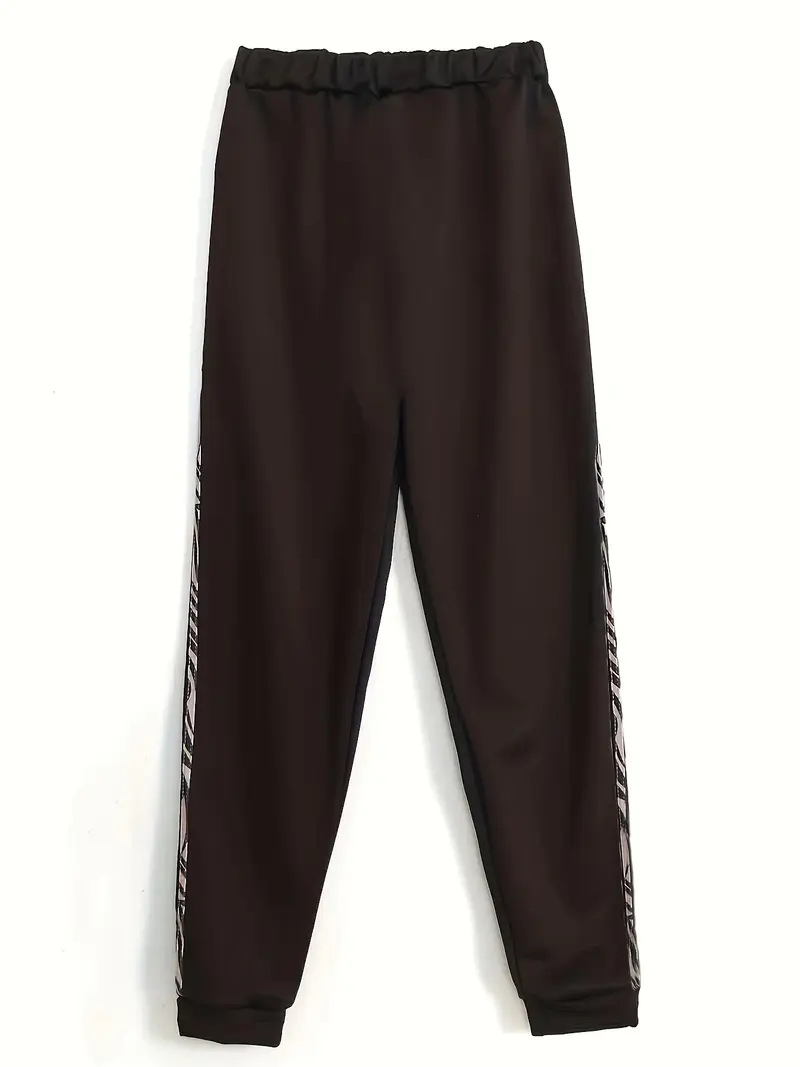 Conjunto de pantalón blanco elegante para mujer estampado leopardo_voghion.com