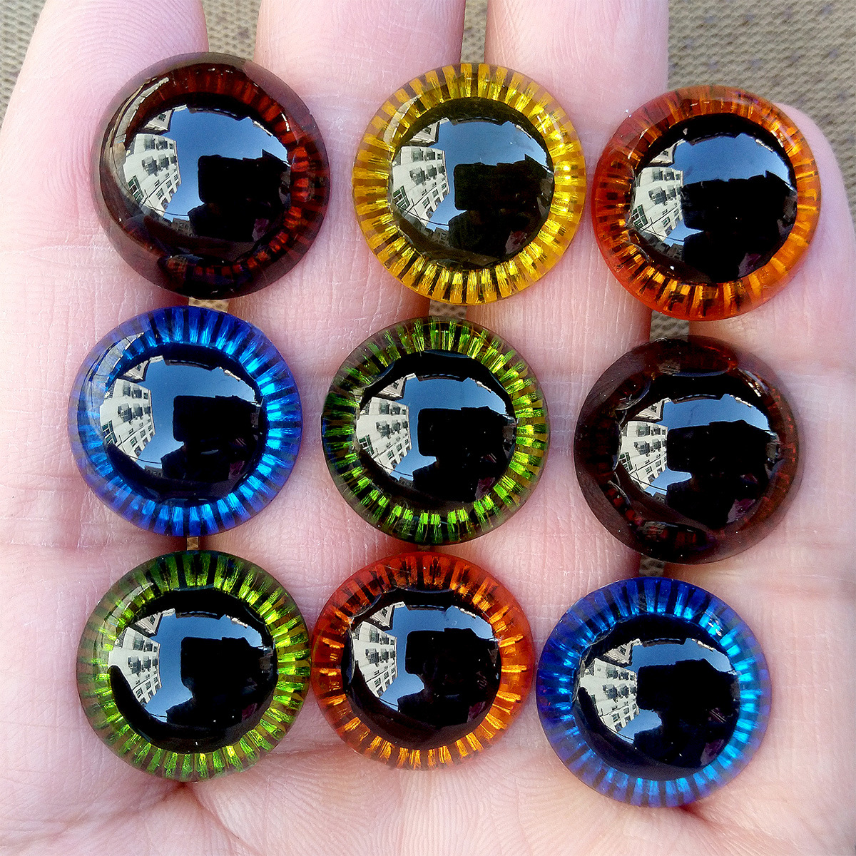 Accesorios de juguete láser ojo cuentas muñeca radiación ojo muñeca fresa oso plástico DIY ojo animal resina ojo