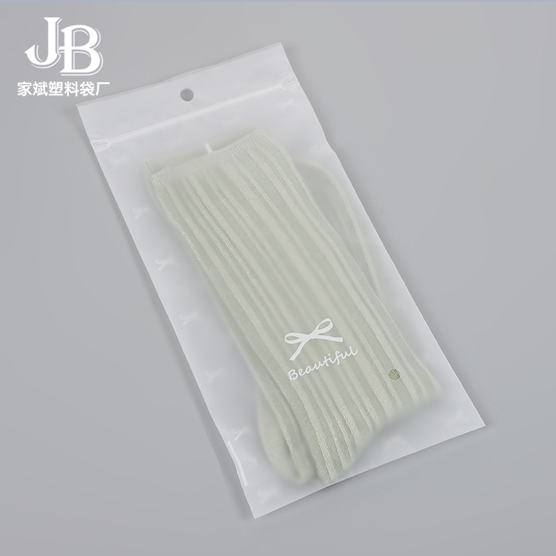 Fabricante spot pe transparente tira de hueso con cremallera calcetines mangas de hielo bufanda de seda bolsa ziplock en blanco con LOGOTIPO