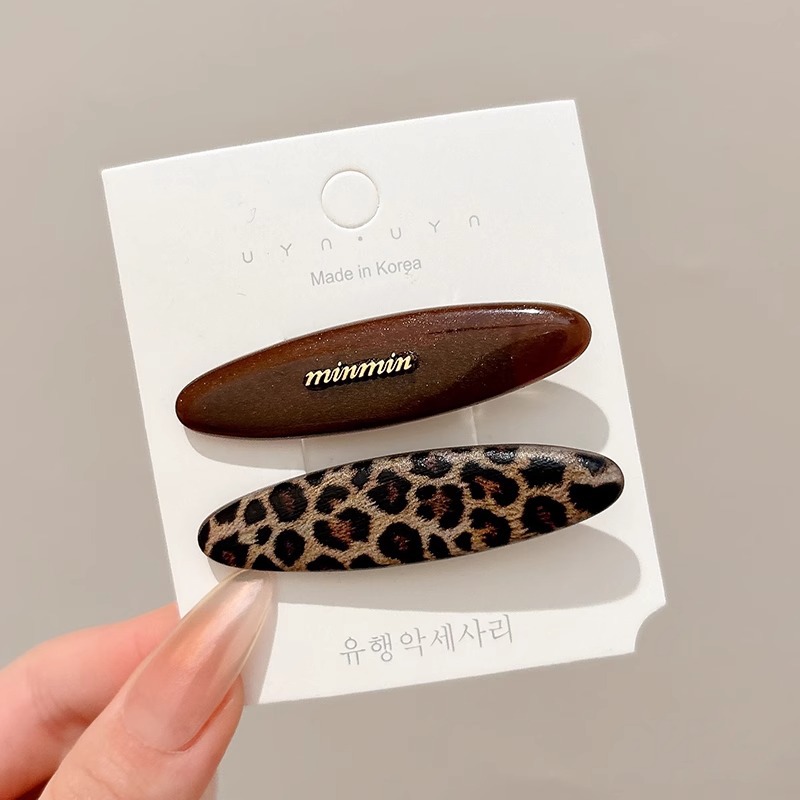 Temperamento acético cabello estriado lateral clip de cabello 2025 nuevo estilo retro puerto clip de boca de pato simple clip de cabello tocado