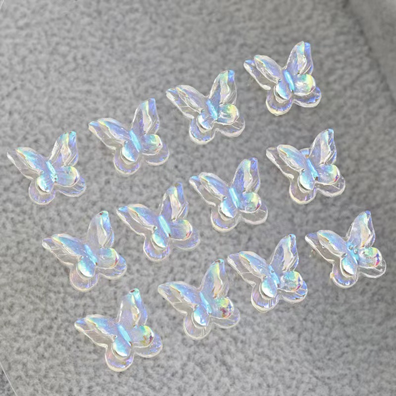 Red explosión de resina de manicura tridimensional permeable al hielo mariposa aurora fantasía doble capa mariposa joyas de uñas al por mayor