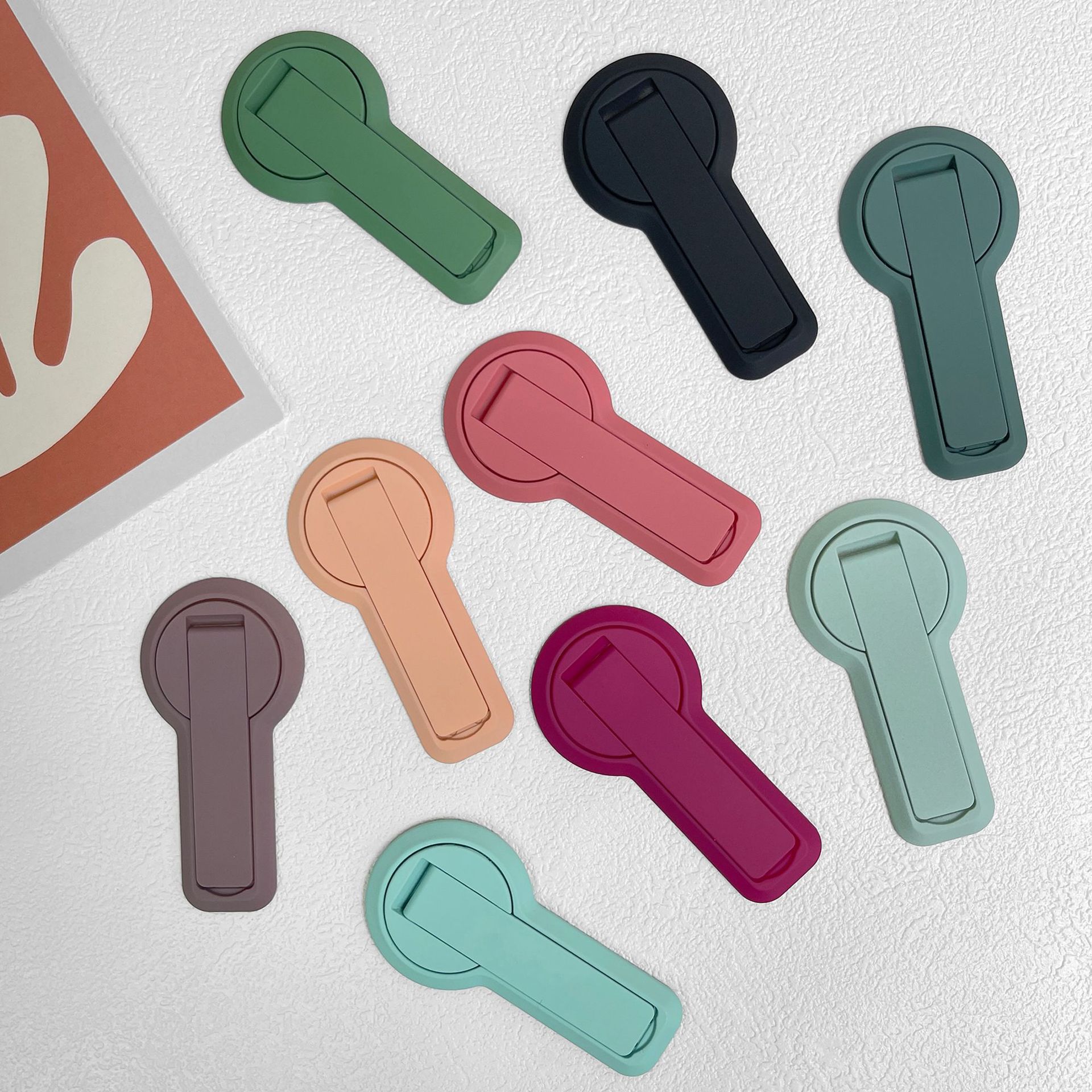 Wholesale mobile phone bracket self-adhesive invisible 360 ° rotating adjustable integrated desktop bracket accessories Universal