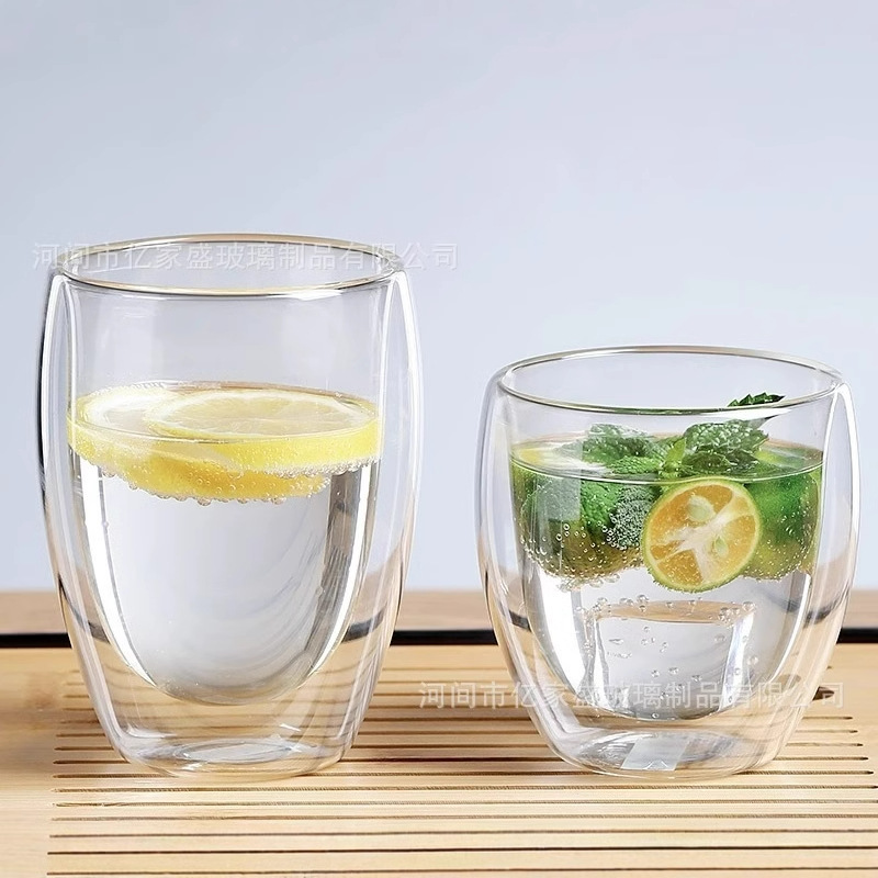 Taza de doble capa en forma de huevo al por mayor de fábrica Taza de vidrio aislante de doble capa Taza de café con leche de jugo simple Taza de vidrio para el hogar