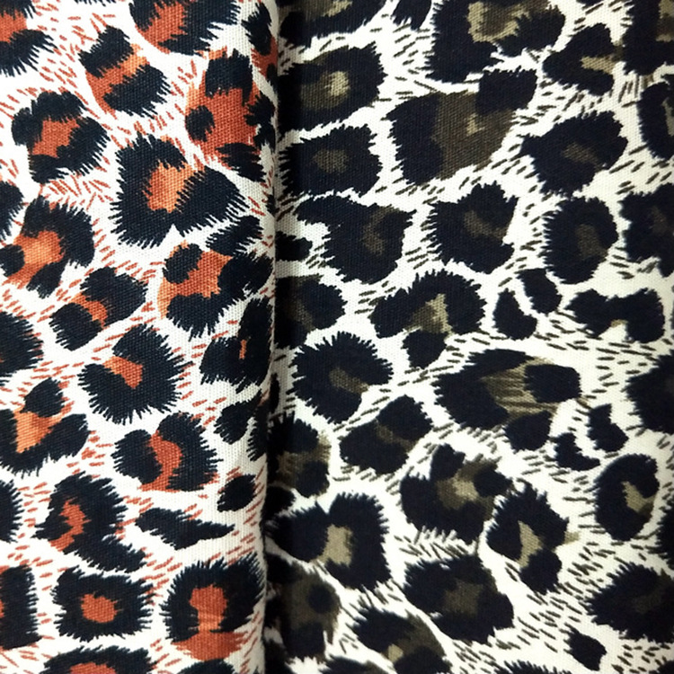 Inventario de alta calidad impresión de leopardo amarillo negro 100 algodón tela de ropa de seda