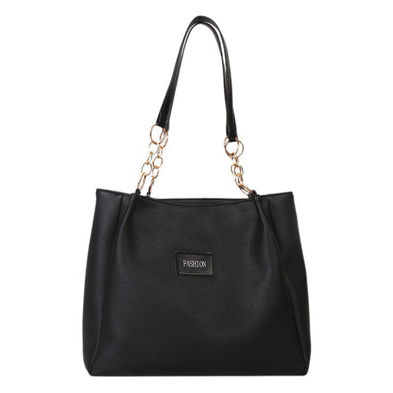 Bolsa de asas de gran capacidad de textura popular de este año para mujeres 2023 nueva moda casual estudiante bolsa de clase bolsa de cercanías