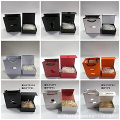 大きい札のふたをひっくり返して香水の箱の本の型の箱のギフトの箱の手提げ袋の化粧品の包装箱を覆います。