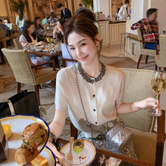 魚のウサギのウサギの丸首のスパンコールニットの半袖の女性2025新型の高級な独特なきれいなニットの上着