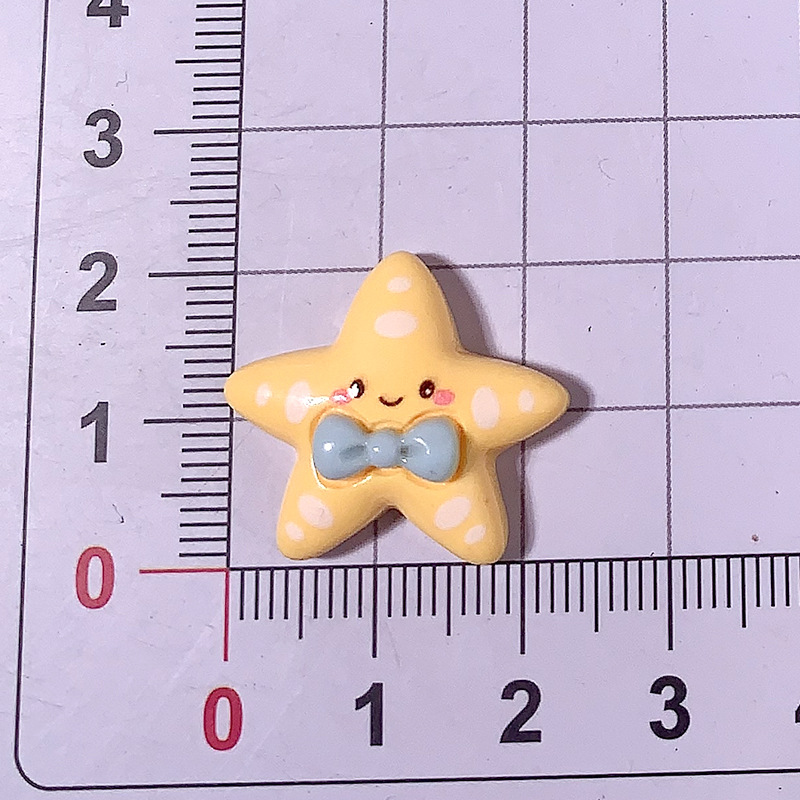 Cartoon brillante corbata estrella de mar material DIY accesorios de resina pegamento crema caja de teléfono móvil material clip de pelo parche de taza de agua