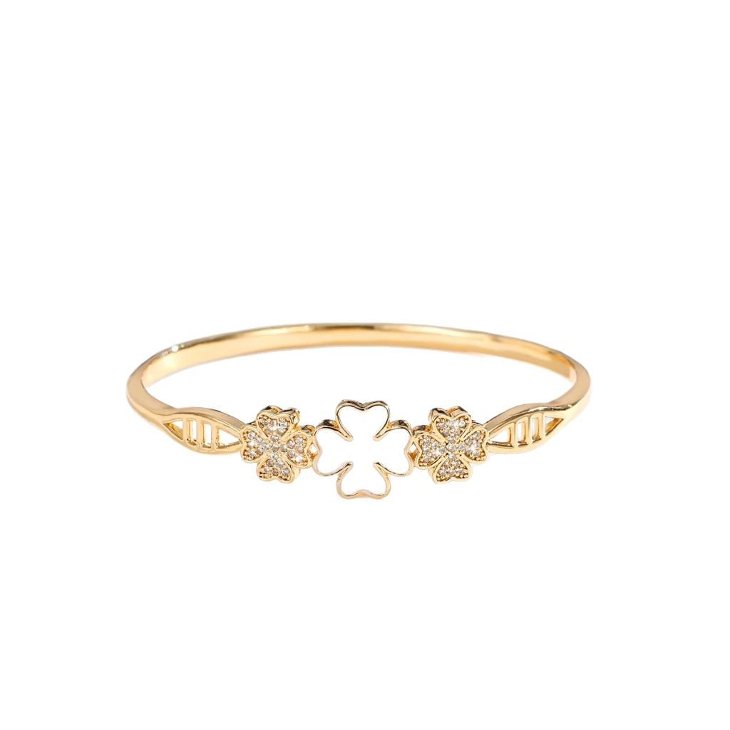 Joyas explosivas transfronterizas, brazalete abierto de trébol de cuatro hojas chapado en oro, sentido de diseño, pulsera de trébol de cuatro hojas con incrustaciones de circón, joyería para mujer
