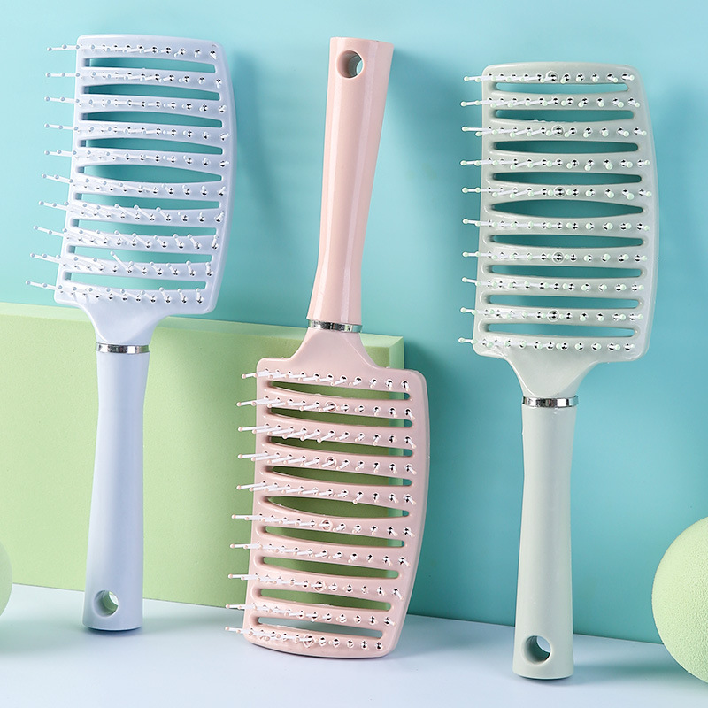 Peine curvo de gran volumen con dientes anchos y huecos para masaje, peinado y masaje del cuero cabelludo.